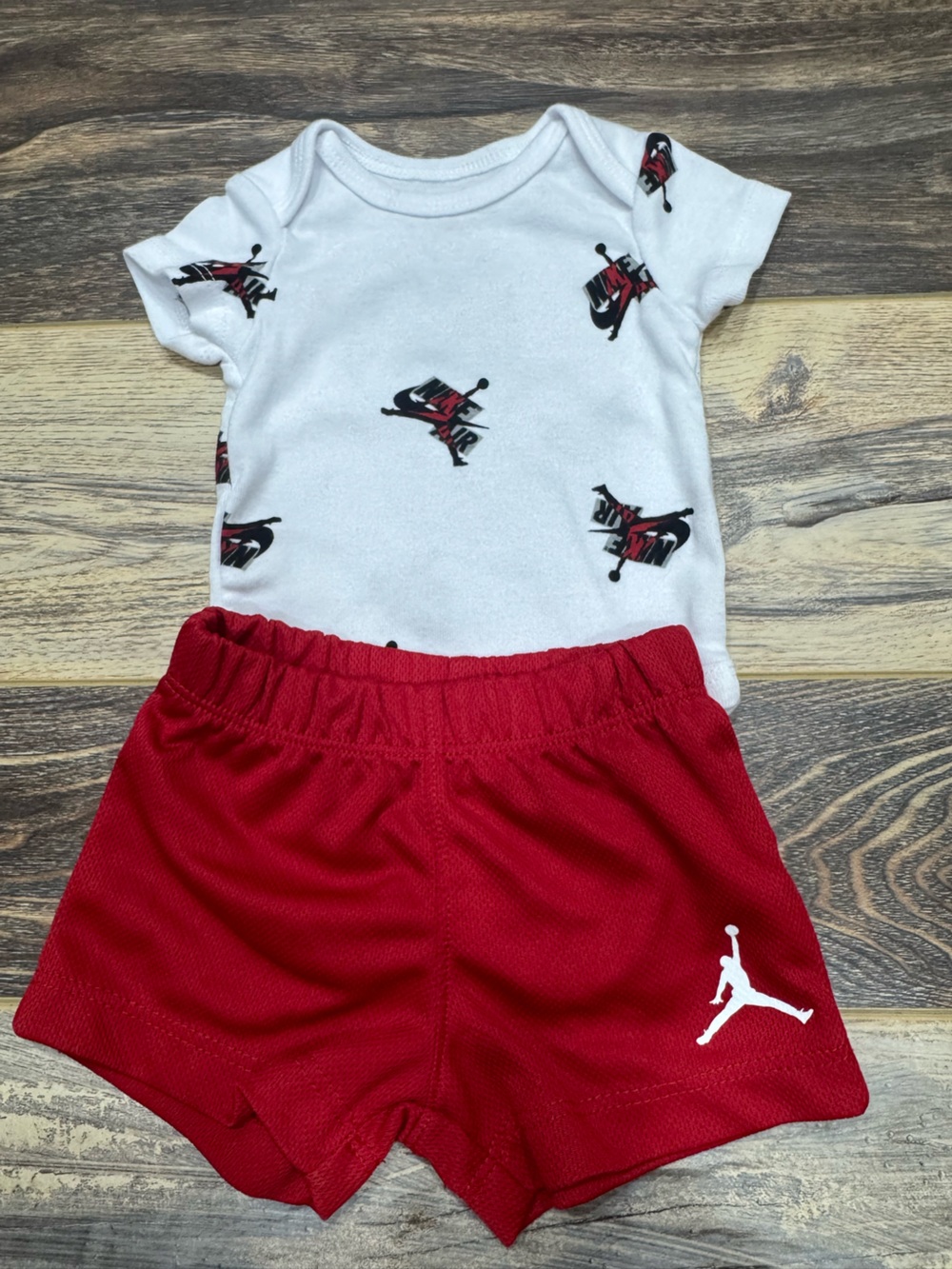 Jordan White Onesie with Red and Black Logo + Red Shorts Set